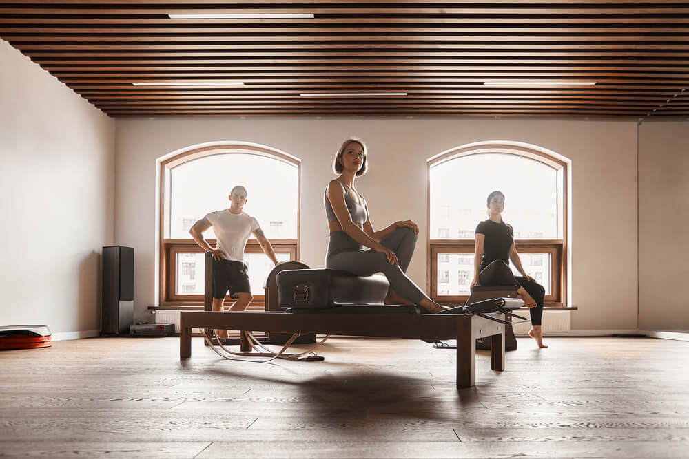 group-of-friends-doing-pilates-kneeling-glutes-exe-2026-03-16-03-39-56-utc.jpg